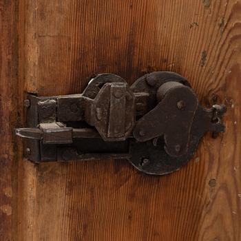 A corner cabinet, 18th Century.