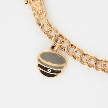 Armband 18K guld med berlocker.