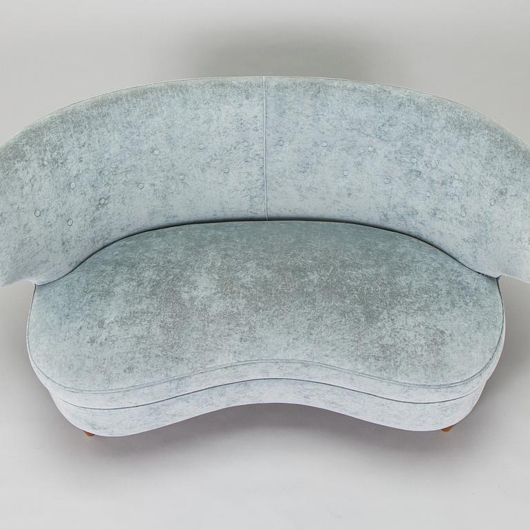 A mid-20th century sofa.