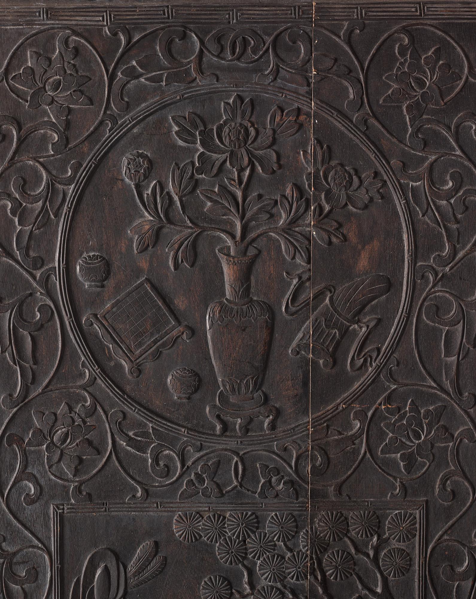 A set of three Chinsese hardwood panels, Qing dynasty.