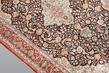 An oriental silk rug, ca 151 x 90 cm.