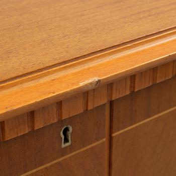 A cabinet, mid-20th Century.
