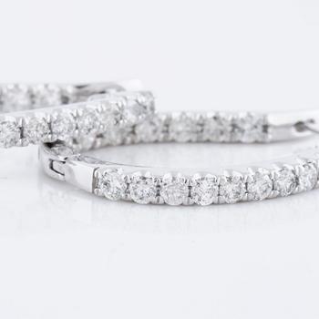 A pair of ca 1.90 cts brilliant cut diamond earrings.