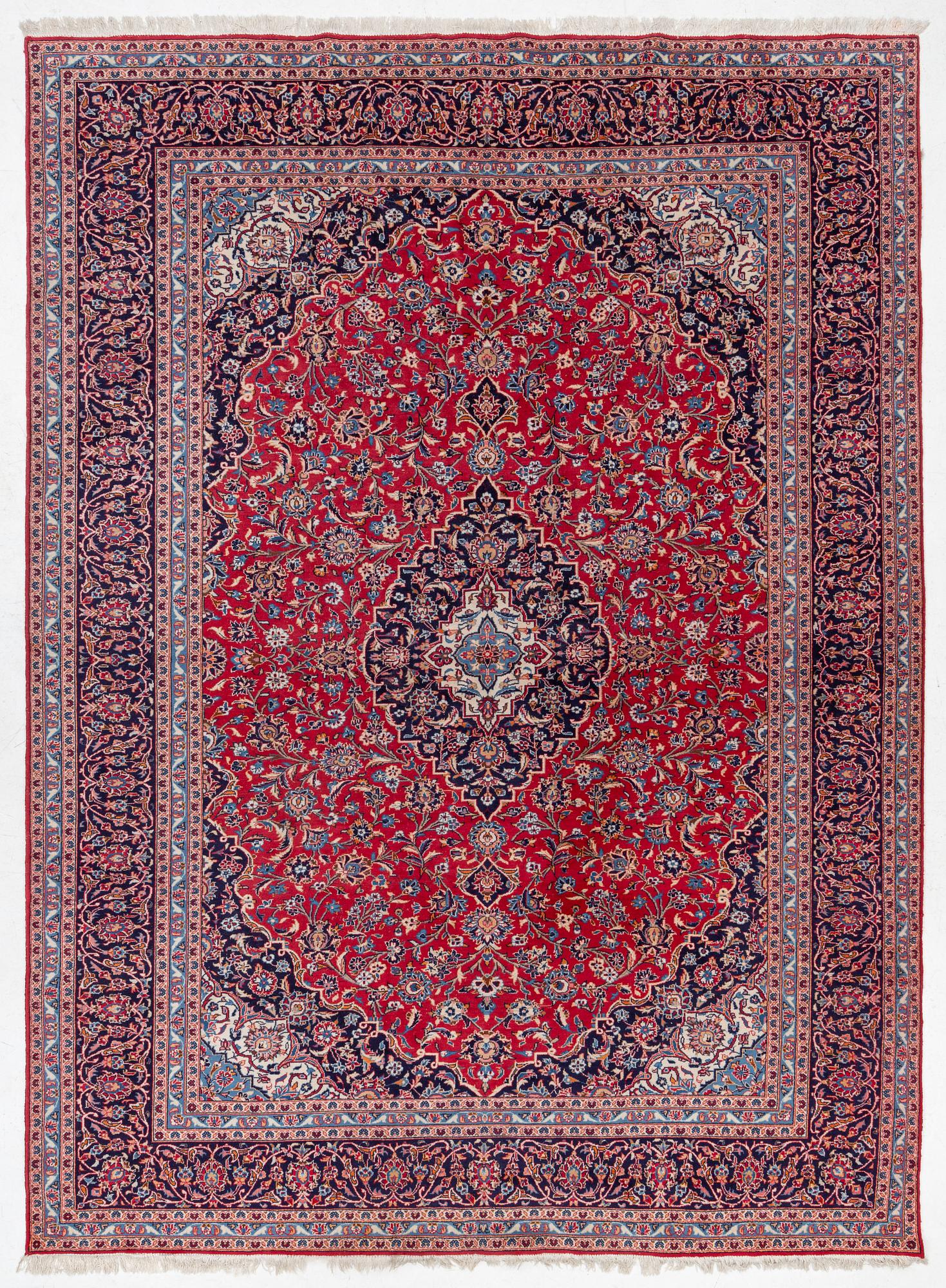 An Old Keshan carpet, approx. 400 x 299 cm.