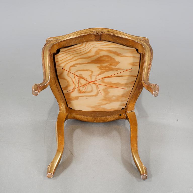 A pair of chairs from the first half of the 20th century.