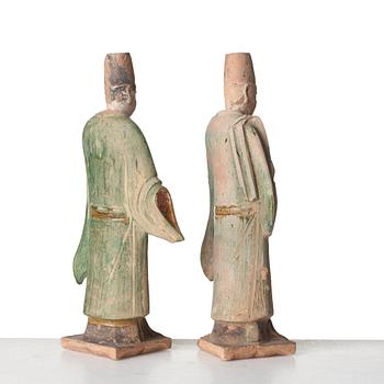 Two green and yellow glazed pottery figures of Ming officials, Ming style, 20th Century.