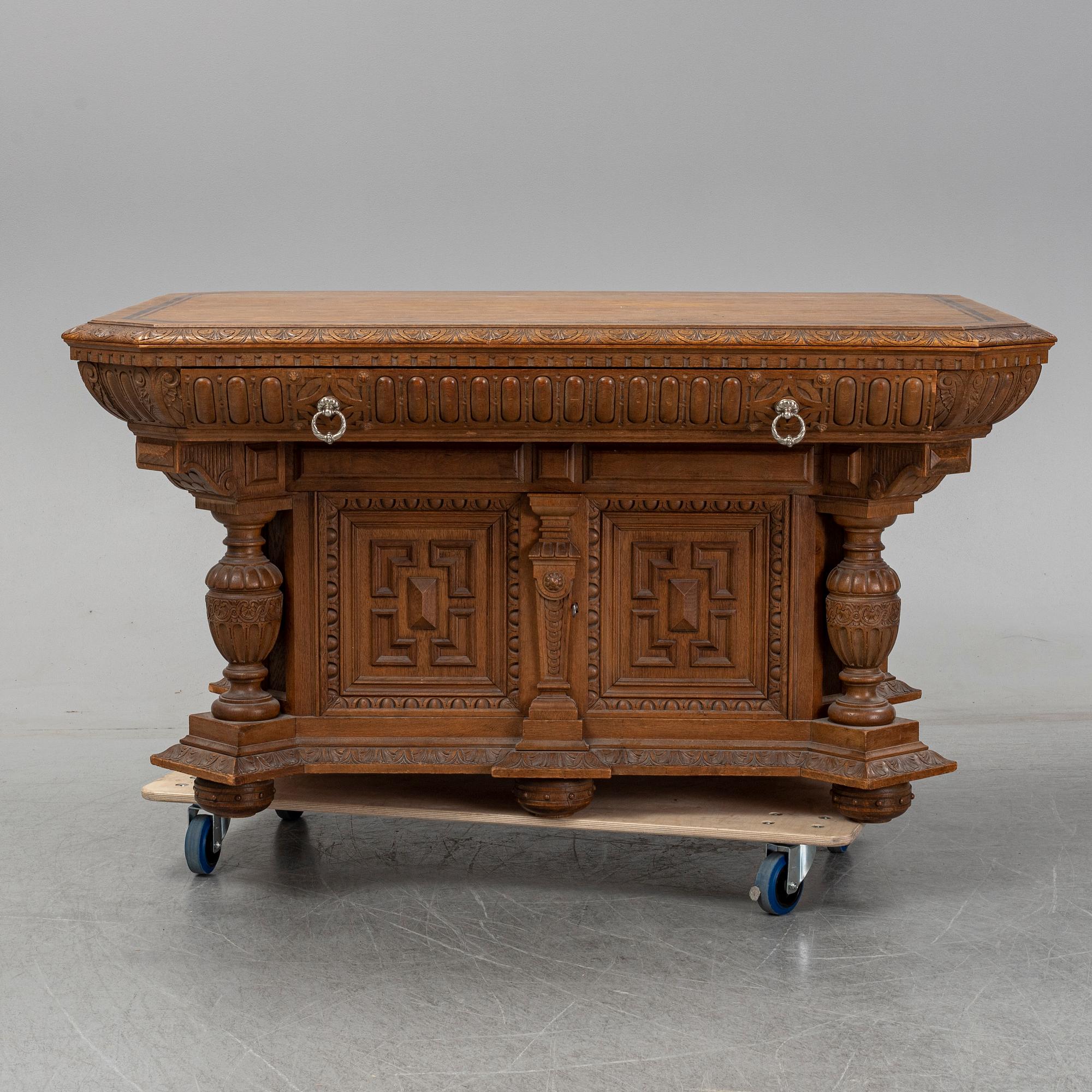 An oak library table, 1890's.