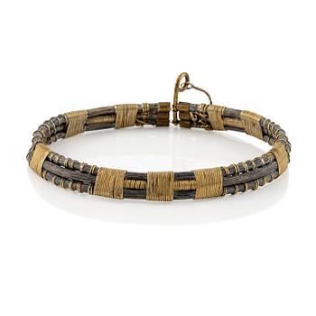 521. Vivianna Torun Bülow-Hübe, a necklace, brass and rattan, Stockholm executed in her own workshop late 1940's.