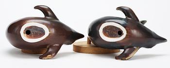 Two Gunnar Nylund stoneware figures of dolphins, Rörstrand.