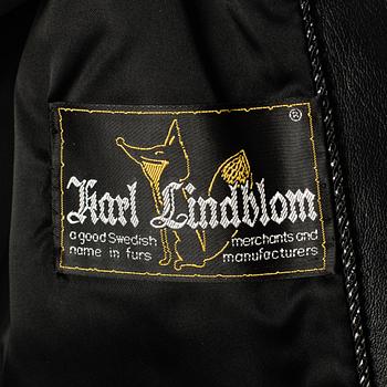 A fox jacket by Karl Lindblom, Stockholm, in size app 38.