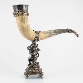 An early 20th century drinking horn with silver plated mount and base.