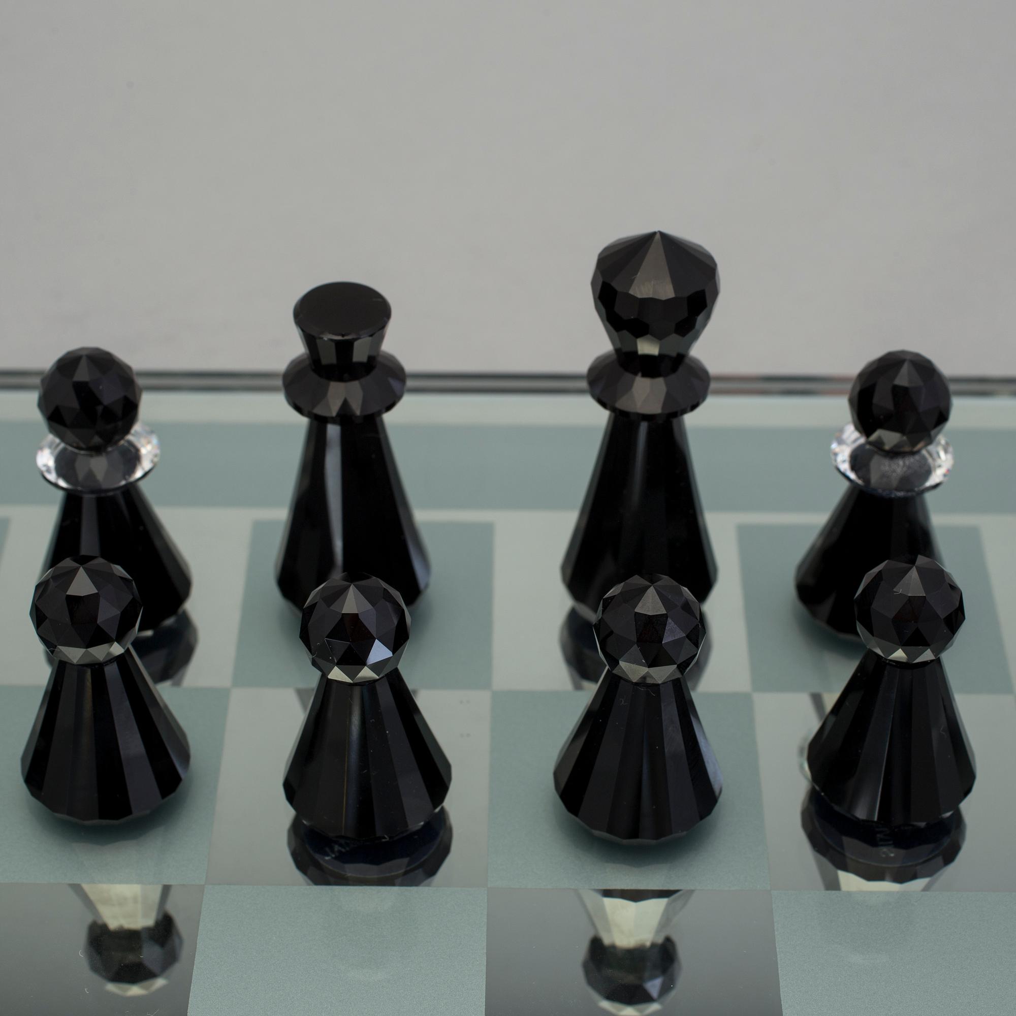 A SWAROVSKI CHESS SET.