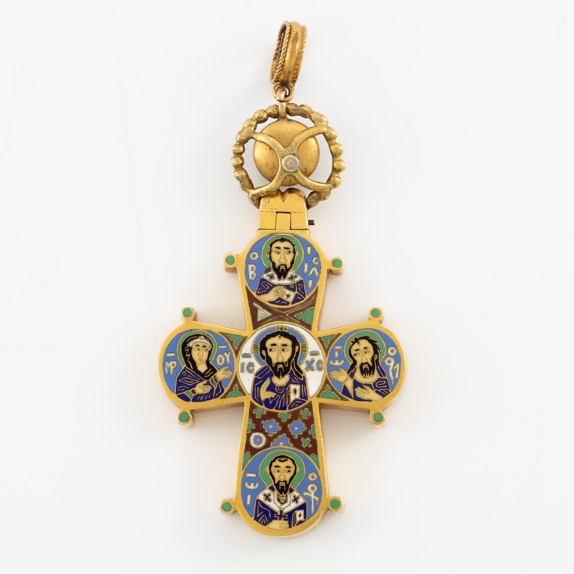 Cross 18K gold with enamel and white stone with relic compartment.