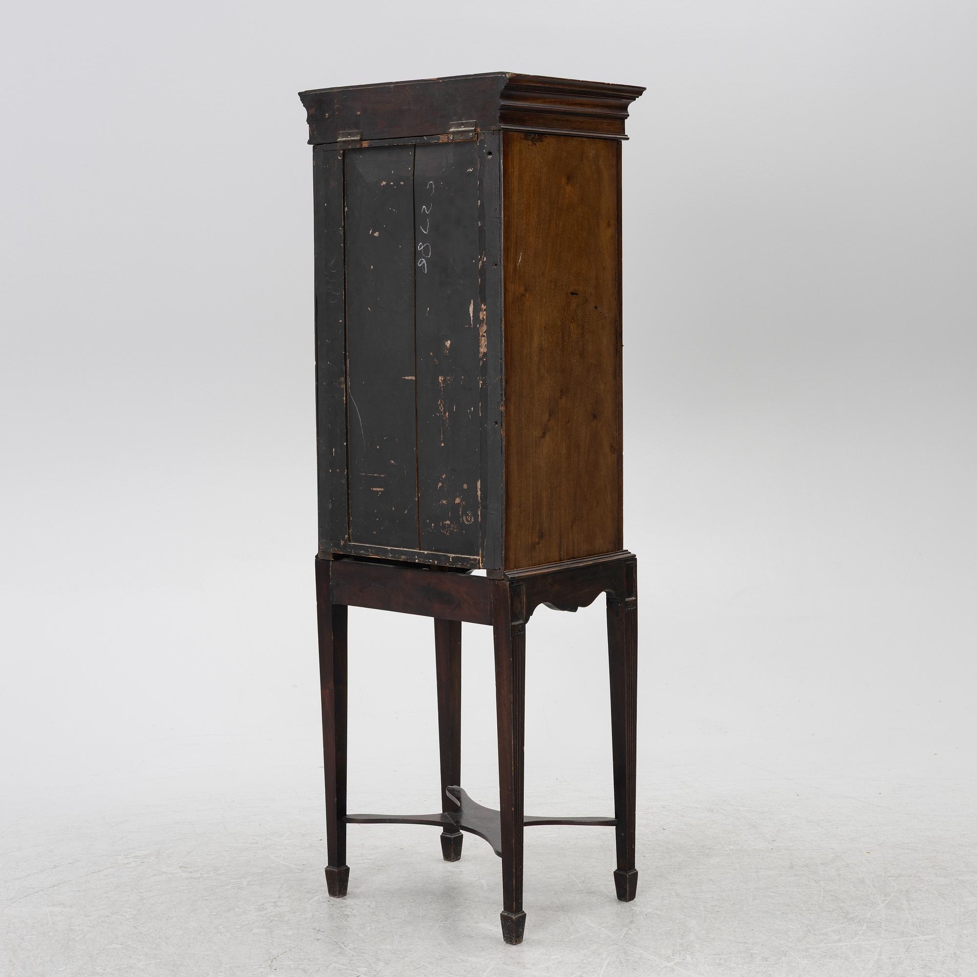 Display cabinet, likely England 19th century.
