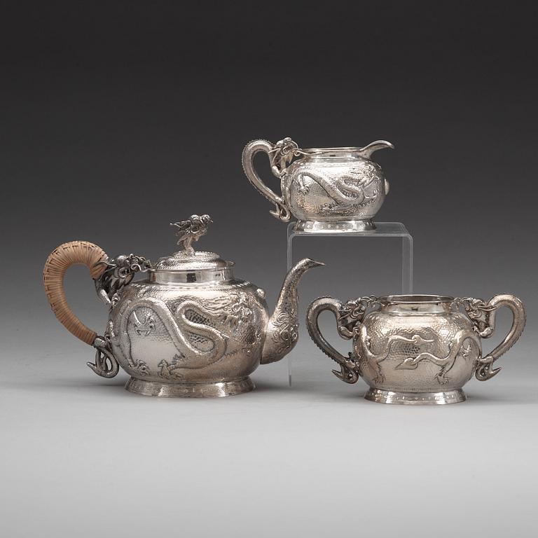 A Chinese three piece silver tea set, early 20th Century.