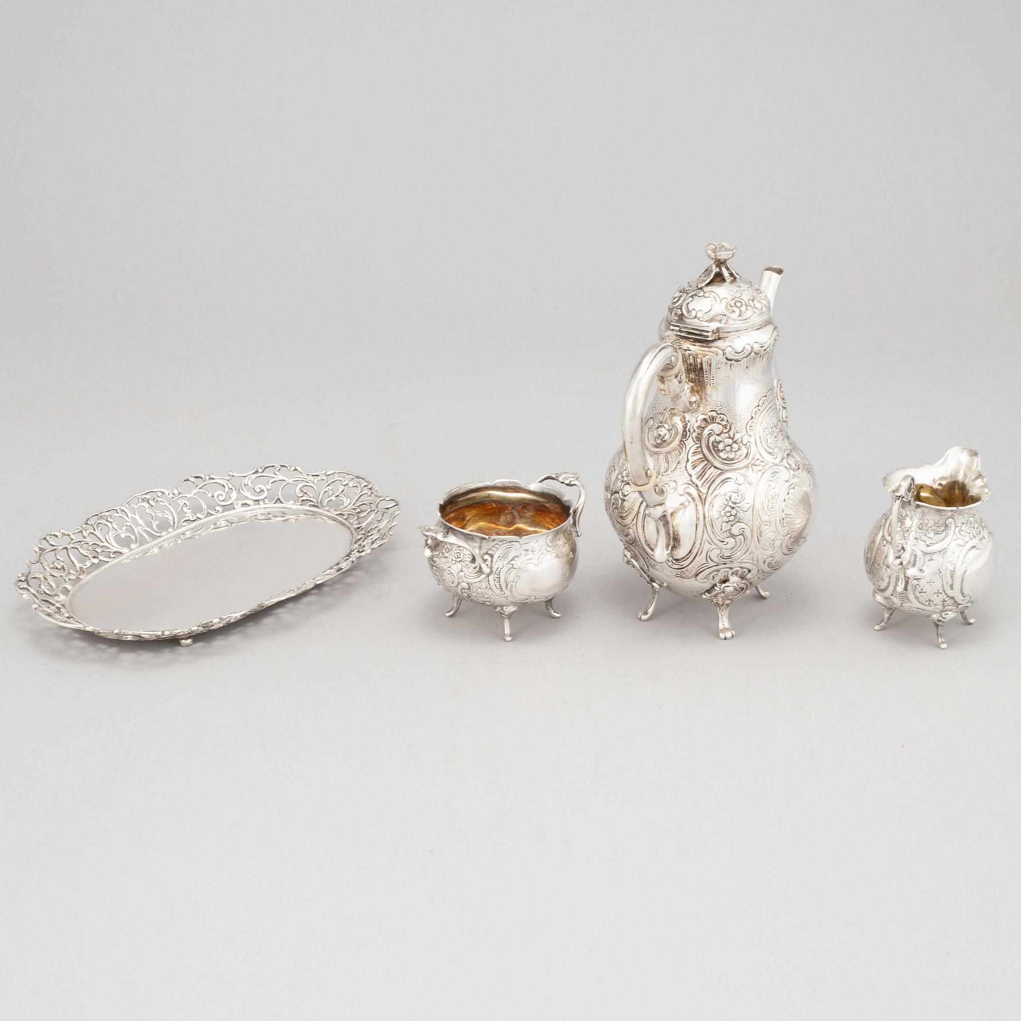 A silver mocha pot, creamer, sugar bowl and tray, some with mark of Gewe, Malmö 1950-51.