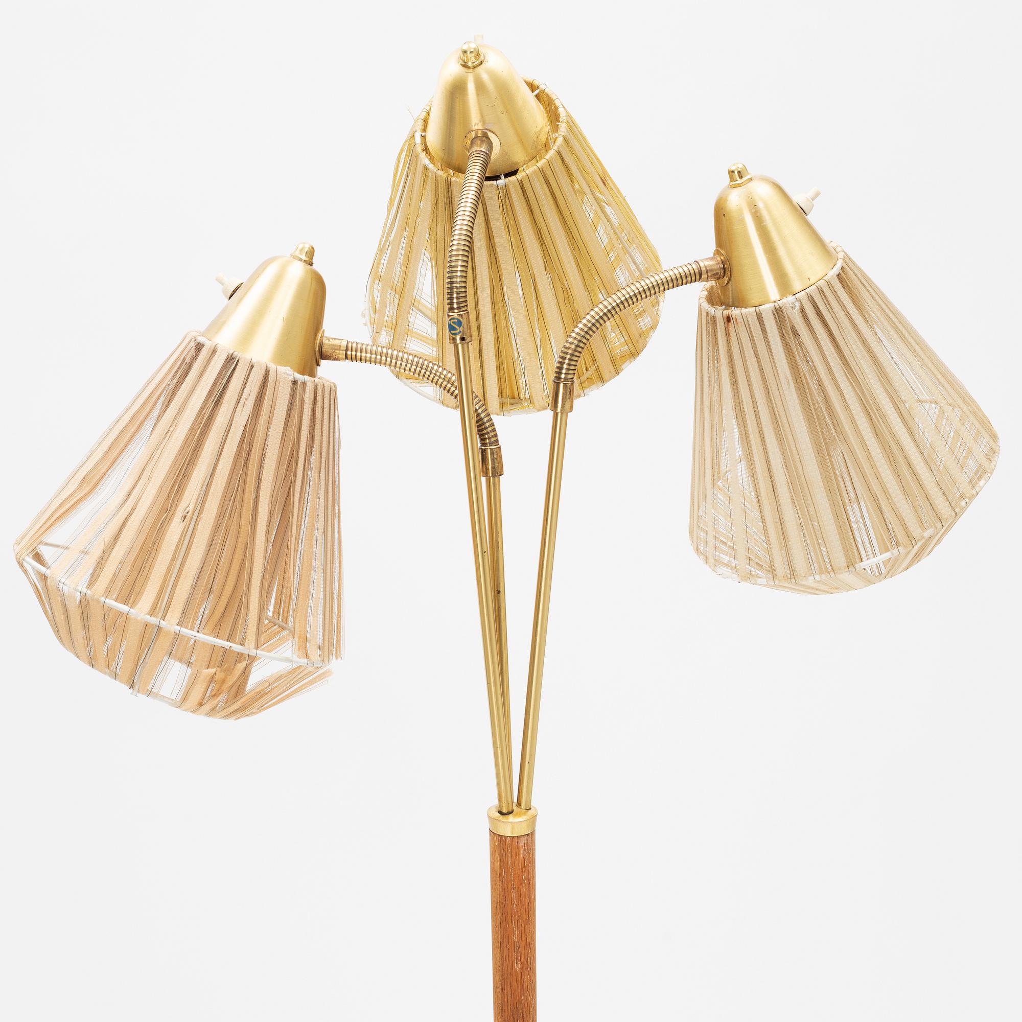 An oak three armed floor lamp from AB Armaturhantverk Göteborg.