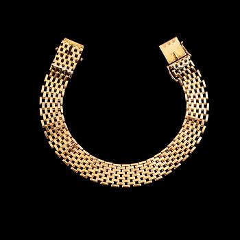 ARMBAND, 18 k guld, svenska stämplar Stockholm 1960. Vikt ca 27 g.