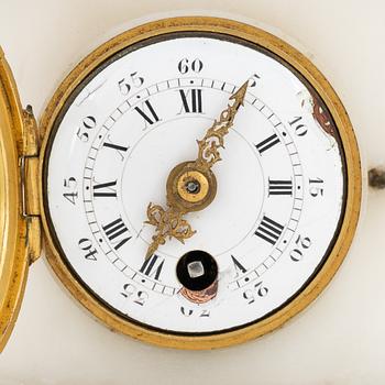 A Louis XVI-style marble and ormolu mantel clock, late 19th Century.