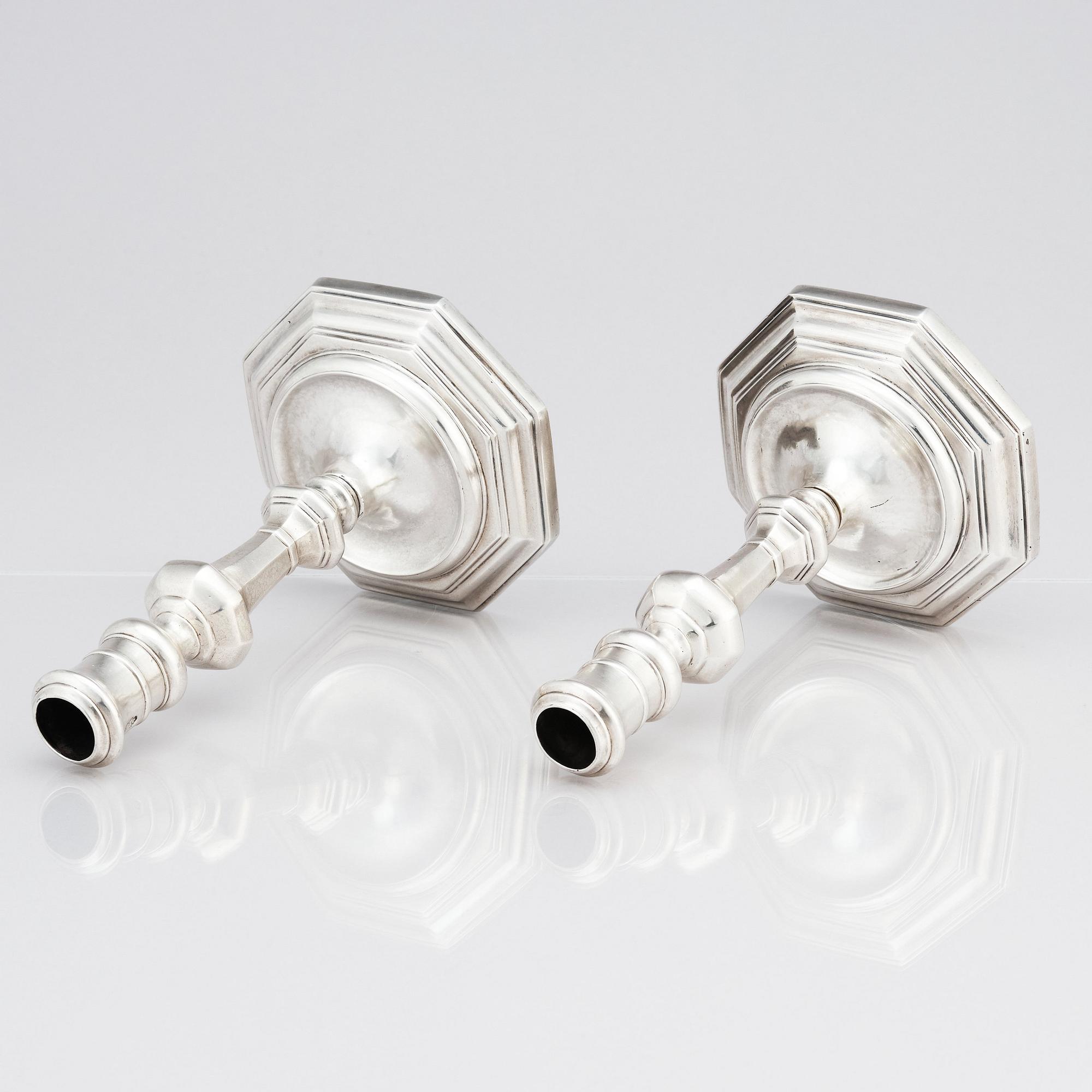 A pair of Italian late 17th/early 18th Century silver candlesticks. Marks of Johann Adolf Gaap (born 1667, died 1724).