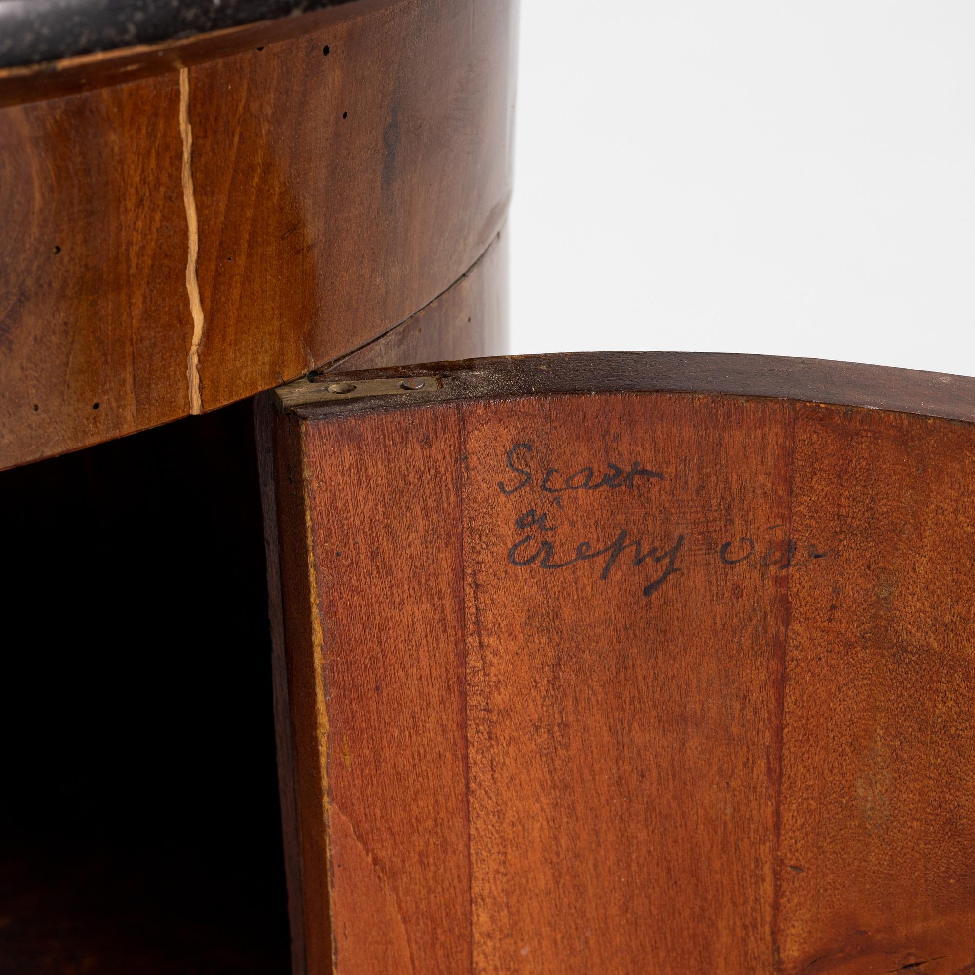 A mahogany veneered cabinet/bedside table with stone top, 19th Century.