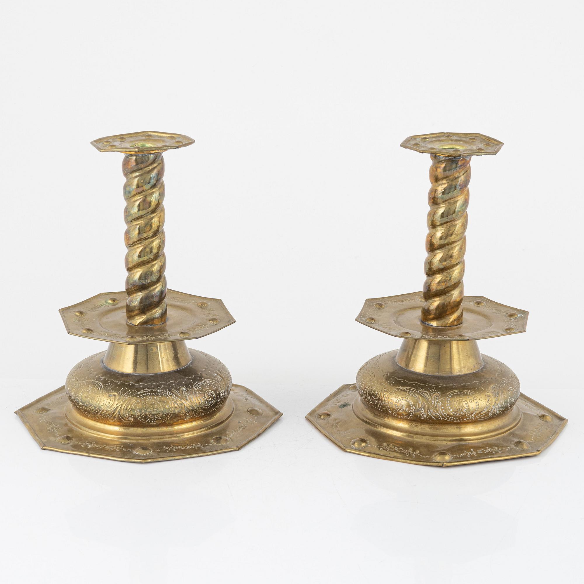 A pair of brass candlesticks, Baroque style, circa 1900.