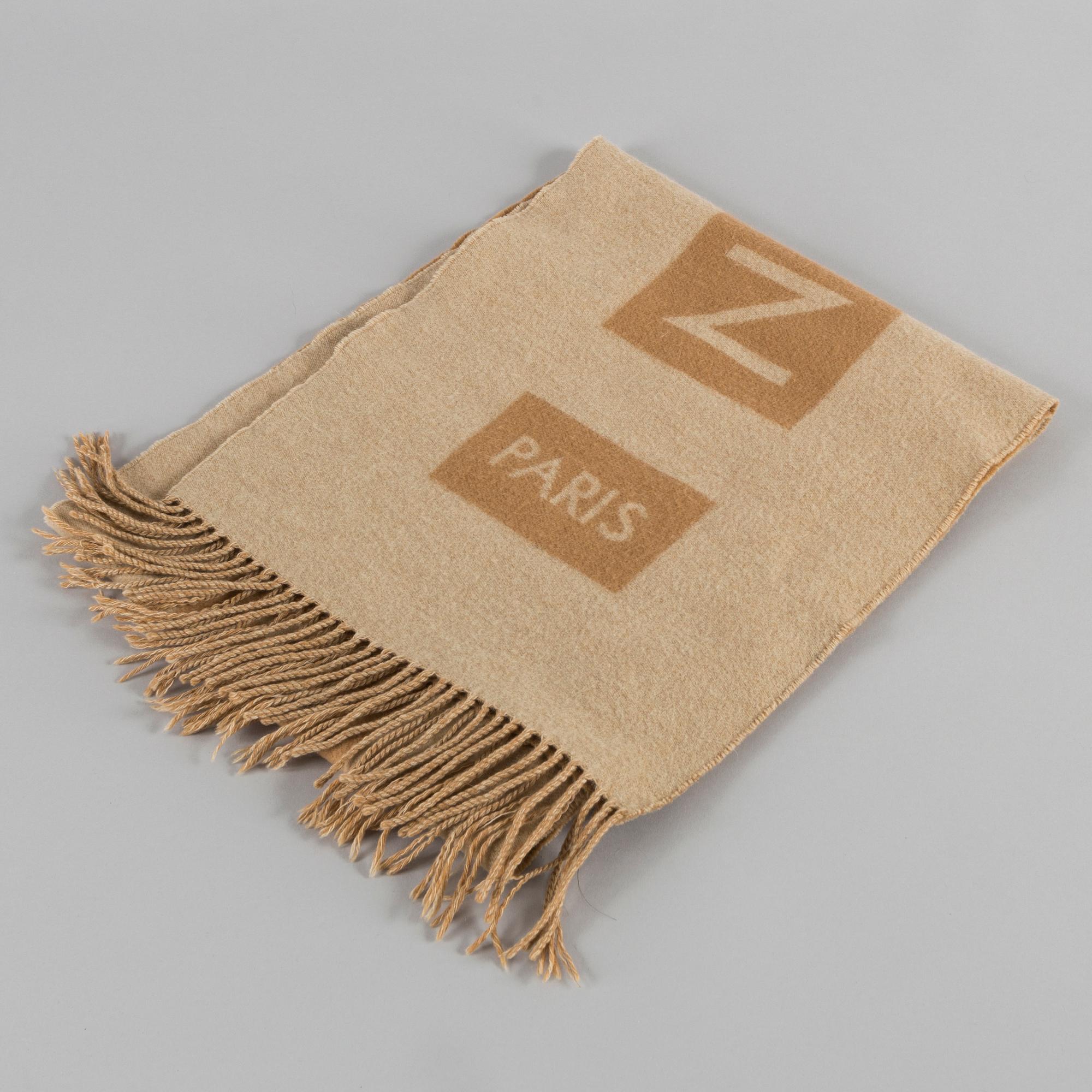 A cashmere scarf by Louis Vuitton.