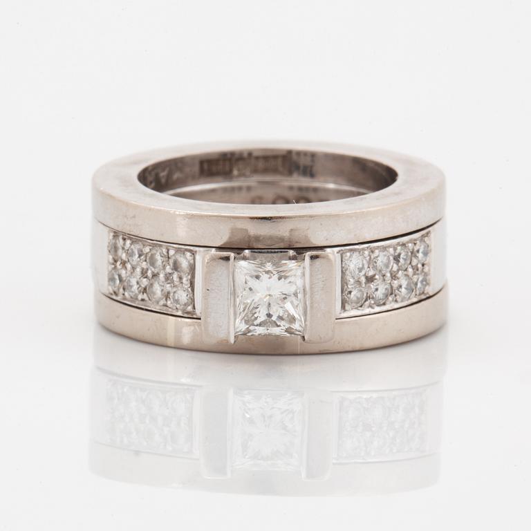Rolf Karlsson, Three rings, 18K white gold with princess-cut and brilliant-cut diamonds, and two band rings.