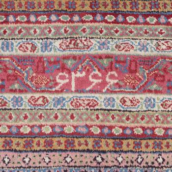 A oriental carpet, signed, c. 295 x 295 cm.