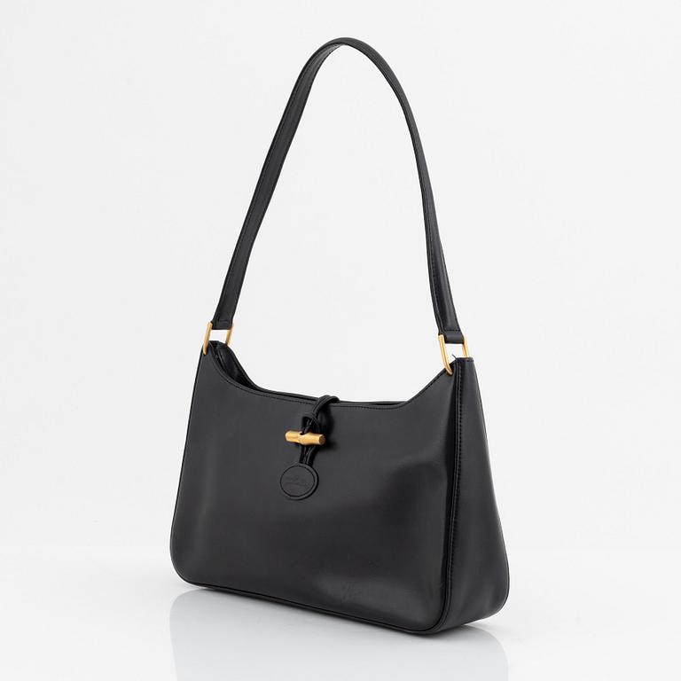 Longchamp, a leather bag.