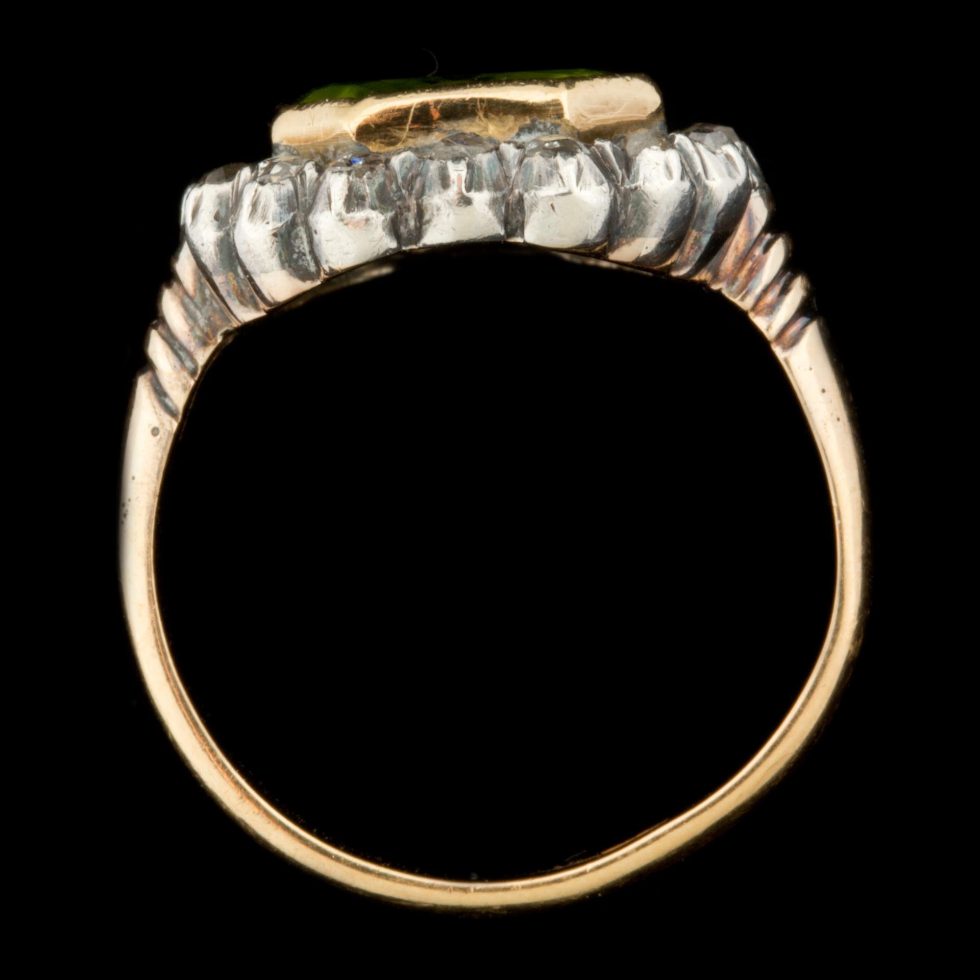 RING, 18 k guld och silver, peridot med rosenstenar. Vikta ca 3 g.