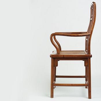 A hardwood and dreamstone armchair, presumably late Qing dynasty.