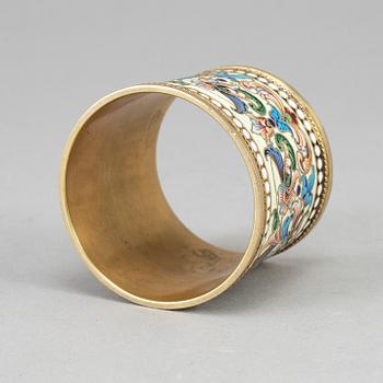 A Russian silver-gilt and cloisonné enamel napkin ring, unidentified makers mark, Moscow 1899-1908.