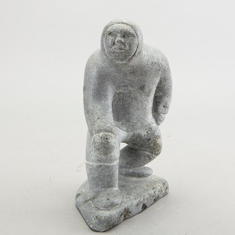 A simon Kristofferson signed stone figurine.