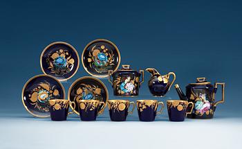 1249. A Russian Coffee service decorated in the 1920's on pieces from the Imperial porcelain manufactory. Signed Z. Kobyletskaya. (7 pieces).