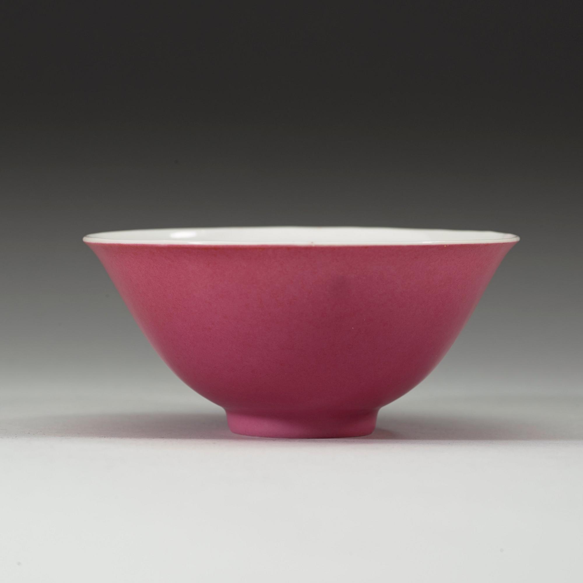 A "hot pink" bowl, Qing dynasty, with Yongzheng six- character mark and of the period (1723-35).