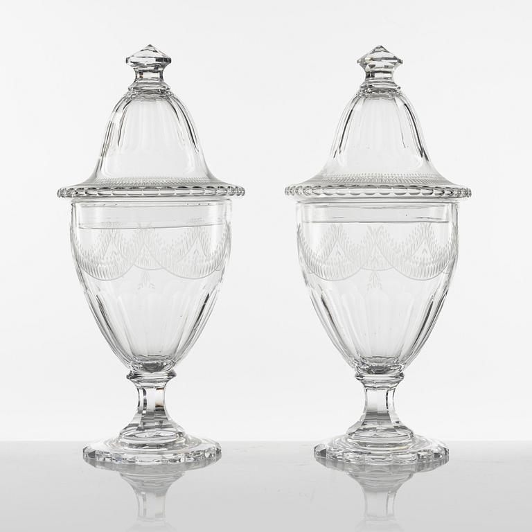 A pair of Gustavian style lidded glass vases, circa 1900.