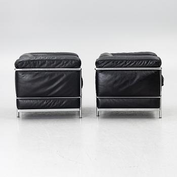 a pair of "LC2" armchairs, Cassina, second half of the 20th century.