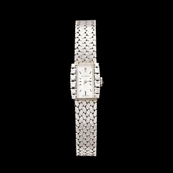 DAMARMBANDSUR, 18k vitguld med 12 briljantslipade diamanter, Movado. Tot ca 39 g.