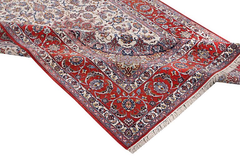 A carpet, Esfahan, part silk, c. 317 x 202 cm.