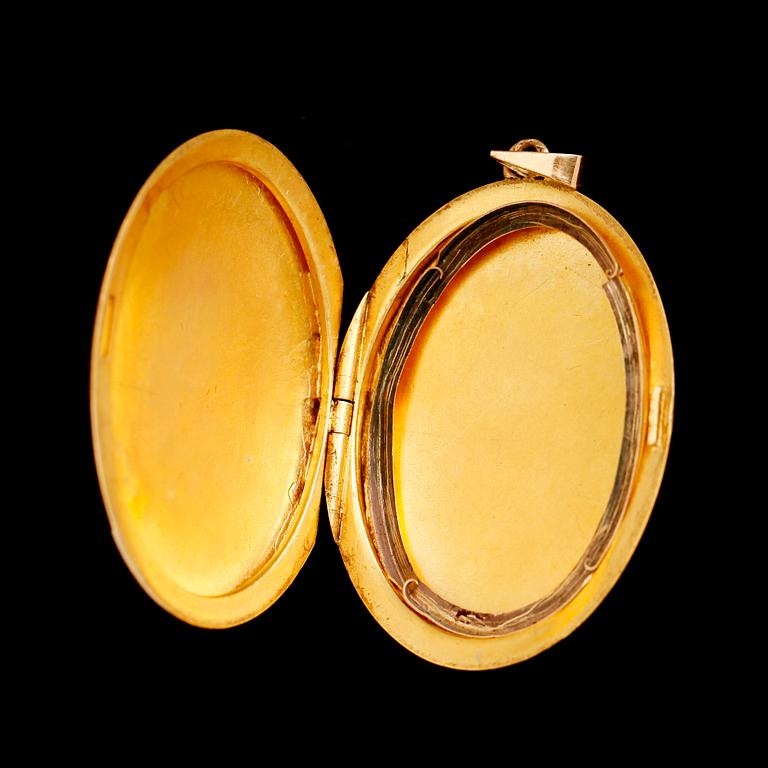 MEDALJONG, 18 k guld, med odlad sötvattenpärla. Vikt ca 8 gram.