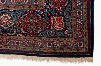 A semi-antique Kashan 'Dabir' carpet, central Persia (Iran), c. 437 x 299 cm.