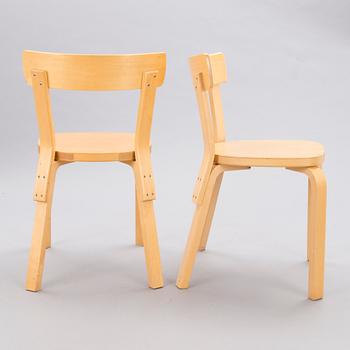 A Set of Three model 69 Chairs by Artek, late 20th Century.