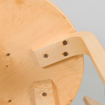 Alvar Aalto, A mid-20th century drop leaf table and three chairs for O.Y. Huonekalu-ja Rakennustyötehdas A.B.