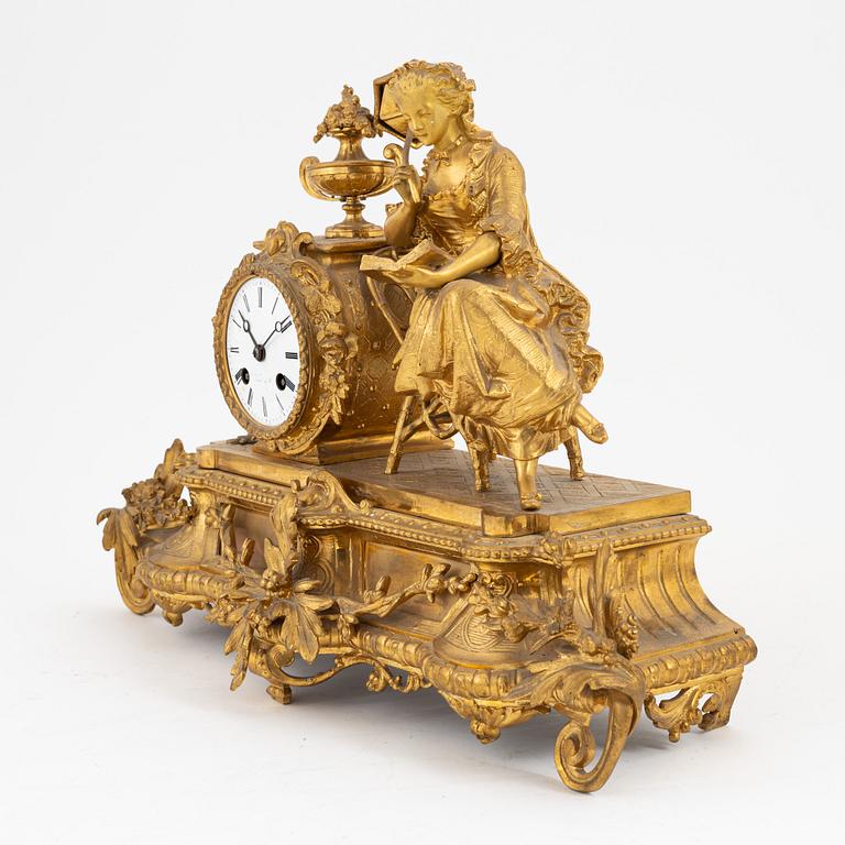 A French Rococo revival table clock, late 19th Century.