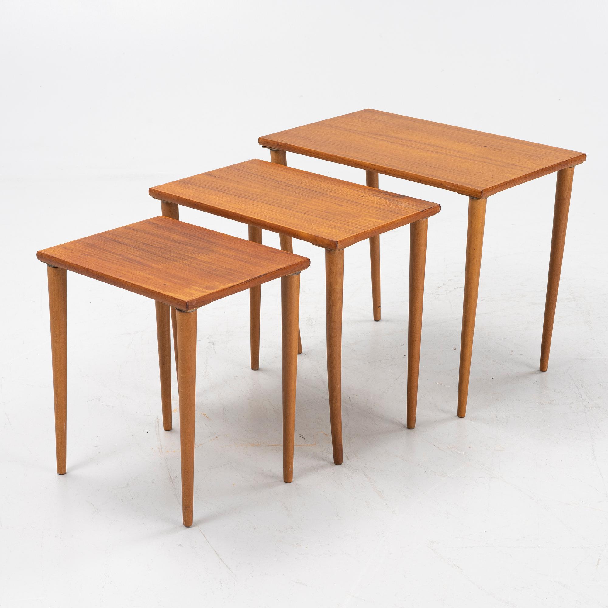 A teak and oak nesting table, 1950s.