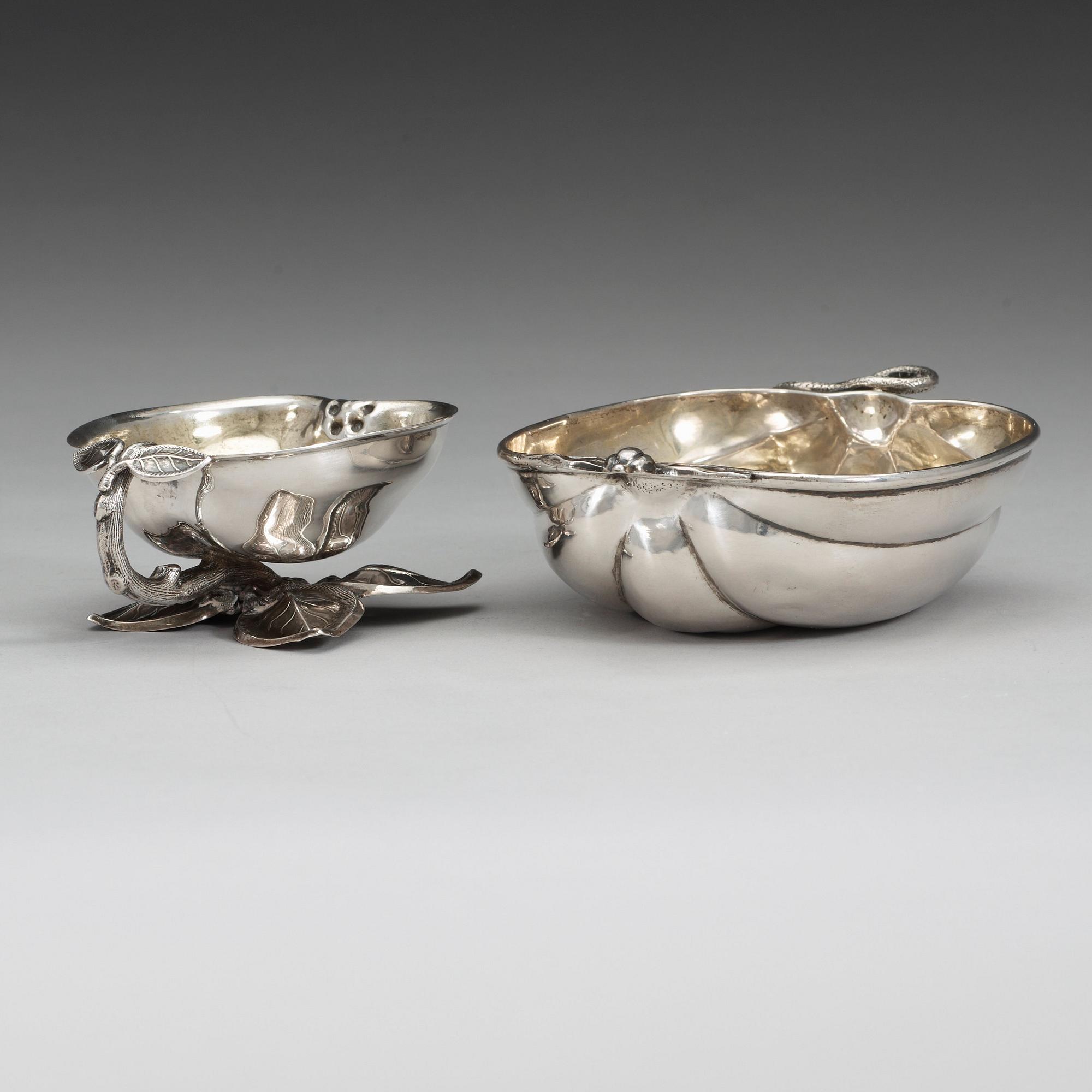 Two Russian mid 19th century parcel-gilt dishes, marked Carl Ekqvist, S:t Petersburg and unidentified maker, Moscow.
