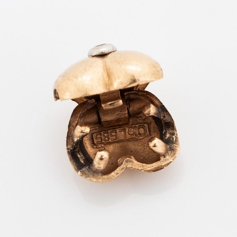 Ole Lynggaard armband och lås 14K vitguld och guld med en rund briljantslipad diamant.