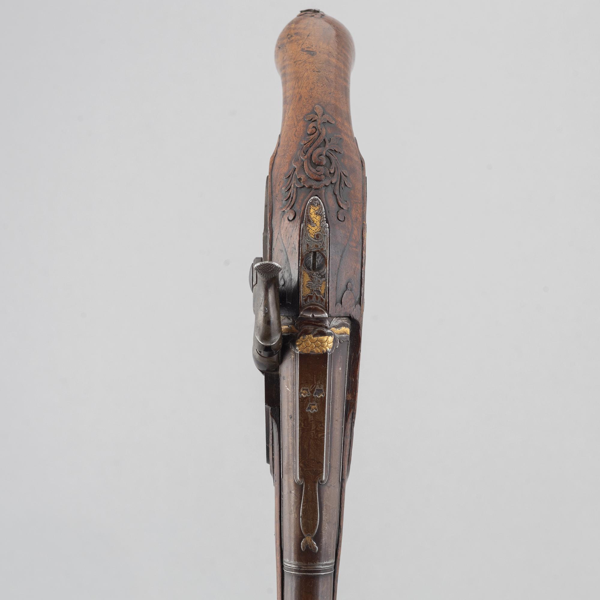 Slaglåspistoler, ett par, ändrade från flintlås,  Nusbaum Stockholm, 1700-talets mitt.
