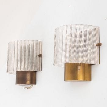 Carl Fagerlund, a pair of wall lamps, Orrefors, mid-20th century.